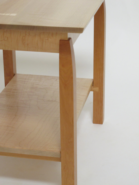 Hand-cut dovetail stretchers support the shelf on this Modern Wood Side Table